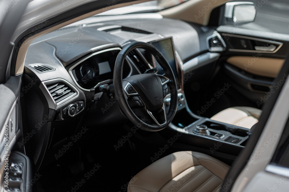Car interior with steering wheel and front seats Car interior with steering wheel and front seats