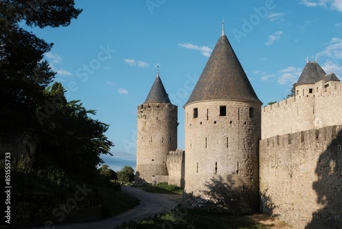 View of Carcassonne Fortress battlemen on sunny morning, France.