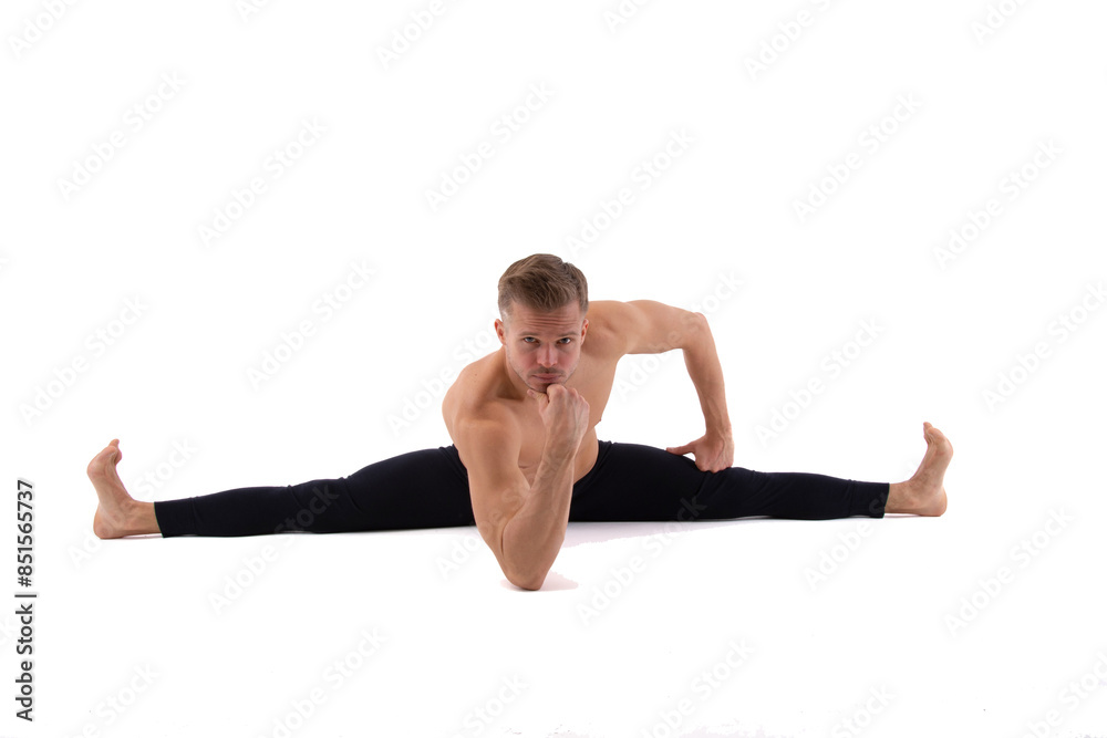 A young attractive man is doing yoga. White background. A young attractive man is doing yoga. White background.