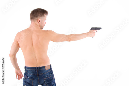 Young attractive man posing over white background.