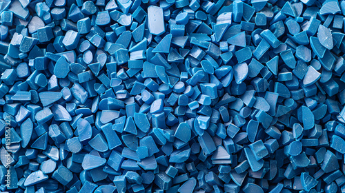 Plastik Granulat in blau, Ein Haufen mit Kunststoffgranulat, PA6, ASA, PP, Glasfaser, hell blaues Kunststoffgranulat zur Produktvorstellung, Kunststofftechnik, Spritzgusstechnik, 3D Druck photo