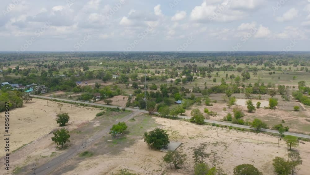 Aerial top view of fresh paddy rice, green agricultural fields in countryside or rural area in Asia, Thiland. Nature landscape Aerial top view of fresh paddy rice, green agricultural fields in countryside or rural area in Asia, Thiland. Nature landscape