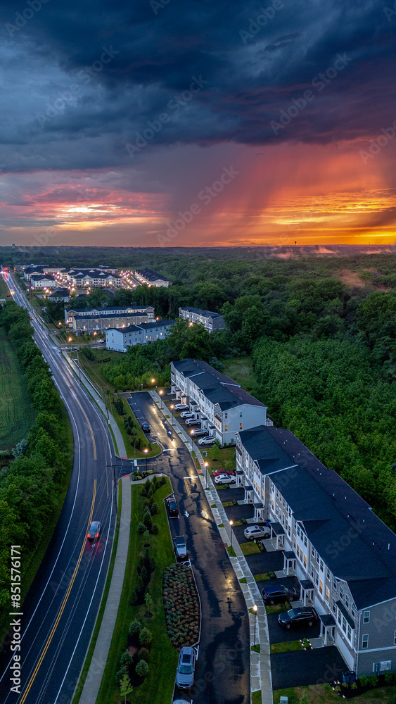 Fototapeta premium Drone of Epic Sunset in New Jersey Suburbs Homes