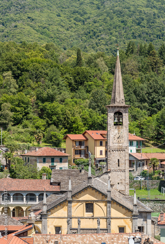 Top view of the bell tower of Santa Maria Assunta church in Mergozzo city, Piedmont, Italy © EleSi
