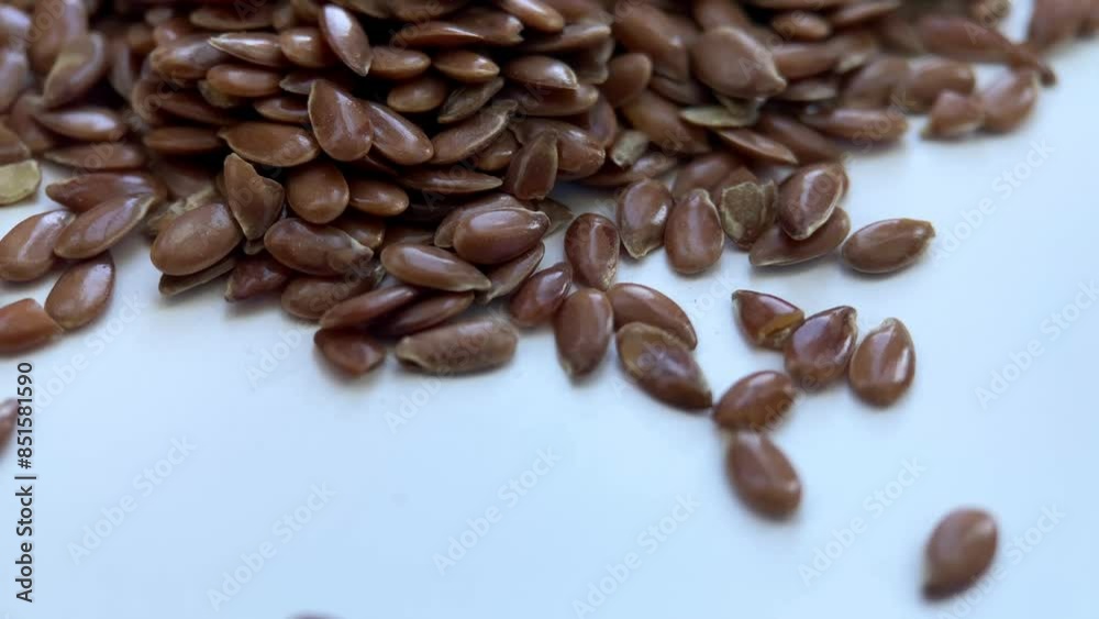 macro, close up of flax seeds, superfood, diet, weight loss, healthy lifestyle, improving digestion, on a white background, spices and seasonings macro, close up of flax seeds, superfood, diet, weight loss, healthy lifestyle, improving digestion, on a white background, spices and seasonings