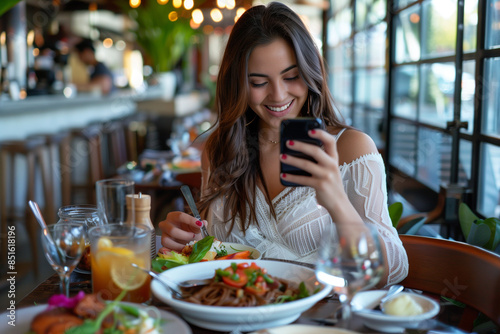 Young woman blogger take a photo for social media before eating. Food photography and lifestyle