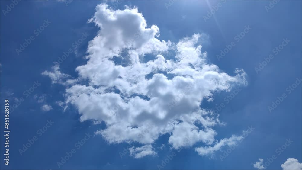 Dark cloud moves through the luminous sky Dark cloud moves through the luminous sky