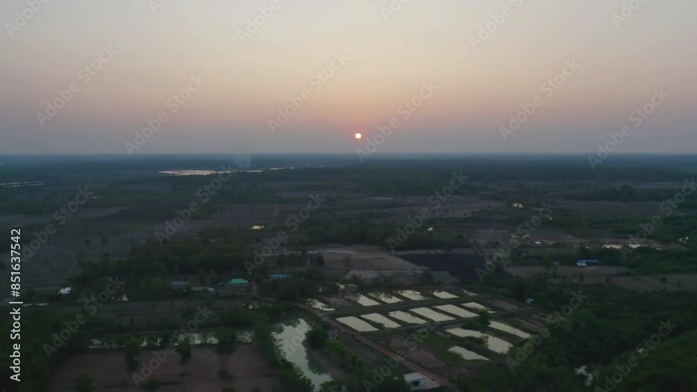 Aerial top view of fresh paddy rice, green agricultural fields in countryside or rural area in Asia, Thiland. Nature landscape Aerial top view of fresh paddy rice, green agricultural fields in countryside or rural area in Asia, Thiland. Nature landscape