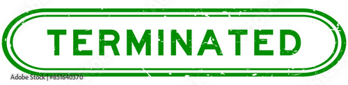 Grunge green terminated word rubber seal stamp on white background