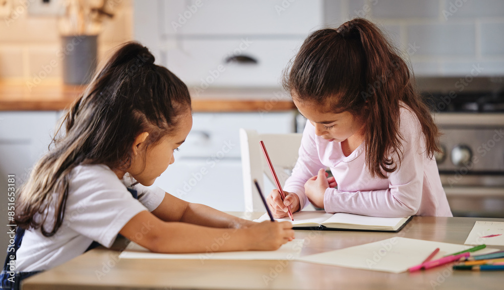 Children, notebook and learning in kitchen house with creative drawing, art and studying for education growth. Girls, artist and writing books, bonding and support for motor development at home Children, notebook and learning in kitchen house with creative drawing, art and studying for education growth. Girls, artist and writing books, bonding and support for motor development at home