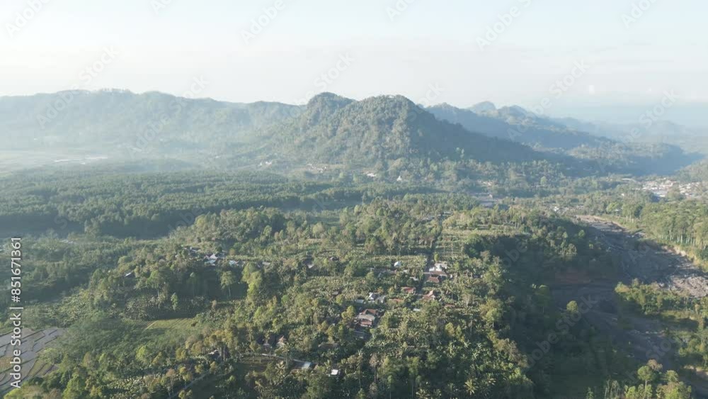 Aerial video of Tabi and the regularly erupting majestic volcano Mount Agung, East Java Indonesia Aerial video of Tabi and the regularly erupting majestic volcano Mount Agung, East Java Indonesia