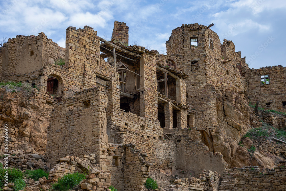 Destroyed houses in the mountain village of Gamsutl. Dagestan, Russia Destroyed houses in the mountain village of Gamsutl. Dagestan, Russia