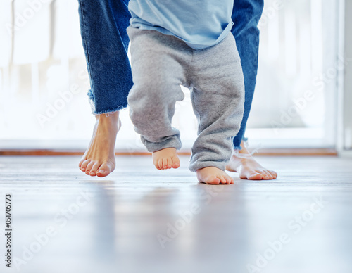 House, mother and baby legs to walk, help and child development with closeup, movement or support. Apartment, learning or mama with infant, growth or teaching balance with trust, motor skill or steps