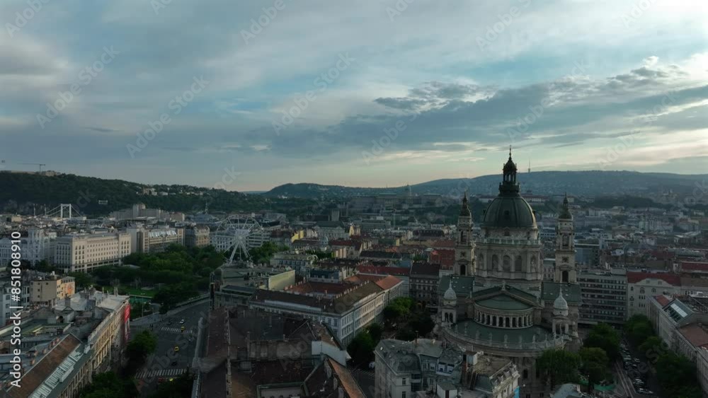 Aerial video about the St Stephens basilica in Budapest, Hungary. Hungarian name is Szent Istvan bazilika. Amazing sunset colors on the background.
Aerial video about the St Stephens basilica in Budapest, Hungary. Hungarian name is Szent Istvan bazilika. Amazing sunset colors on the background.