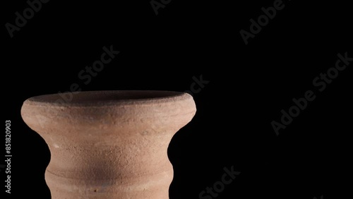 old clay jug rotating on turntable 360 ​​degrees. 4k video capture