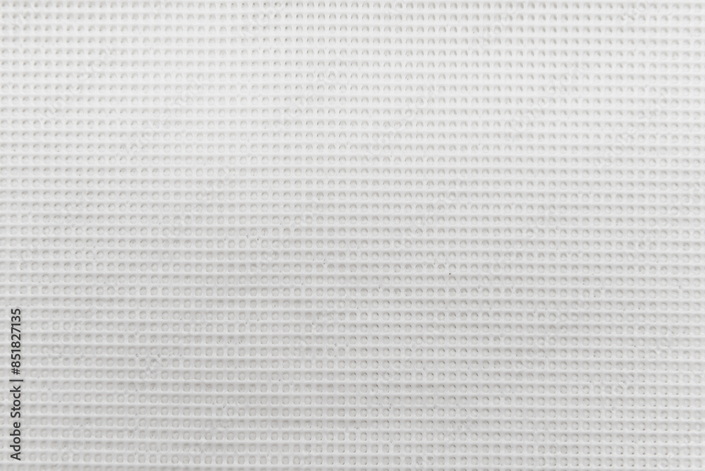 Texture of a white mesh silicone mat. Silicone material background. Net Texture of a white mesh silicone mat. Silicone material background. Net