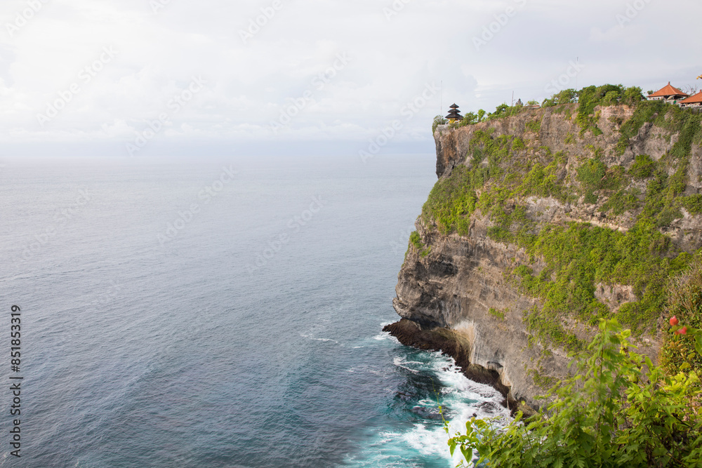 Beautiful view of Uluwatu rock at sunset in Bali, Indonesia