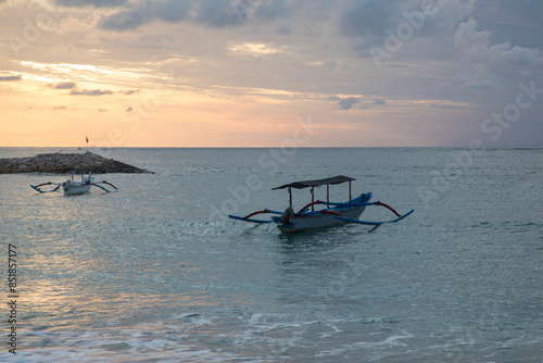 Beautiful view of the boats on Kuta beach in Bali Island, Indonesia	
