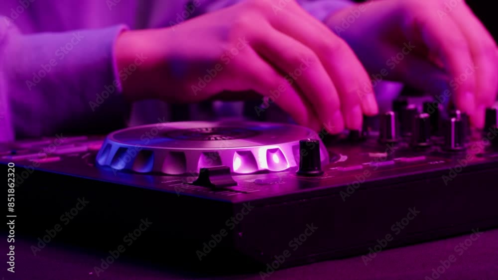 DJ playing music on festival in night club. Techno musician with headphones and sunglasses performing at nightclub for concert crowd of people, city bar. DJ playing music on festival in night club. Techno musician with headphones and sunglasses performing at nightclub for concert crowd of people, city bar.