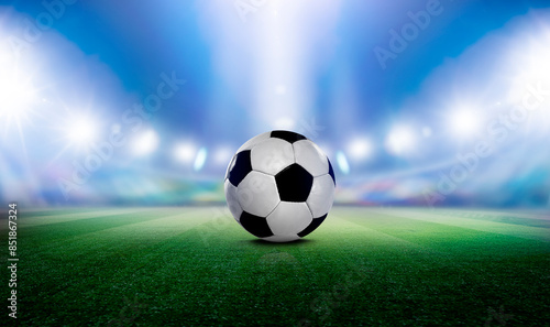 Fußball im einer Fussballarena im Scheinwerferlicht 2024