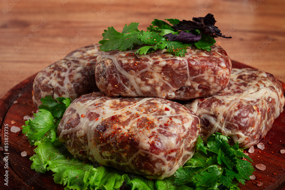 raw apkhazura, a dish of Georgian cuisine, meat balls, minced meat wrapped in a fat net, seftalia, homemade, no people, raw apkhazura, a dish of Georgian cuisine, meat balls, minced meat wrapped in a fat net, seftalia, homemade, no people,