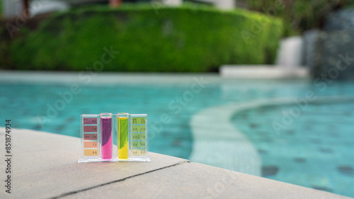 Foto pH and chlorine level chemical droplet test kit for swimming pool service and maintenance equipment object