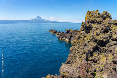 Natural arch of Velas next to the sea. São Jorge Island-Azores-Portugal. photo