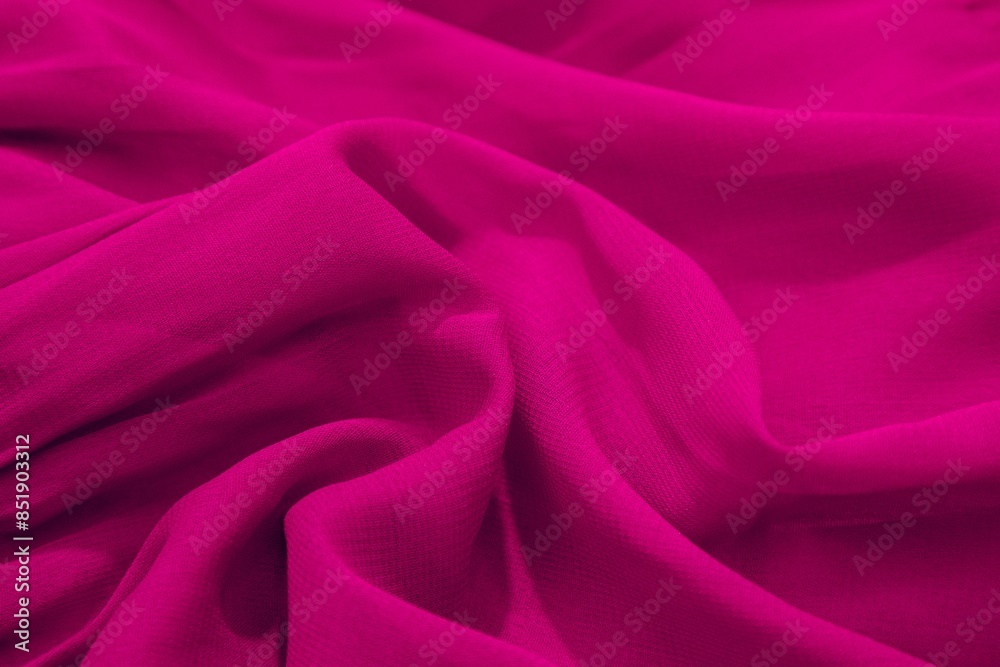Close-up of vibrant magenta fabric with soft folds and texture Close-up of vibrant magenta fabric with soft folds and texture