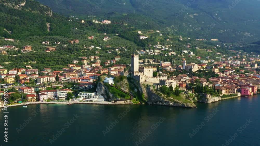 Scaligerburg Malcesine Lake Garda Aerial View with Castle, Scenic Blue Water and Mountains, Idyllic Summer Vacation Destination, Clear Sky and Historical Town Background Scaligerburg Malcesine Lake Garda Aerial View with Castle, Scenic Blue Water and Mountains, Idyllic Summer Vacation Destination, Clear Sky and Historical Town Background