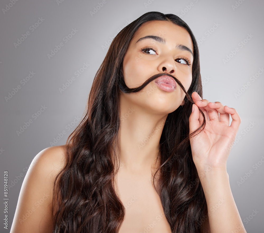 Hair care, funny or girl in studio with mustache for confidence, meme or keratin treatment results. Silly humor, playful woman or goofy model on grey background for beauty, natural growth or joke Hair care, funny or girl in studio with mustache for confidence, meme or keratin treatment results. Silly humor, playful woman or goofy model on grey background for beauty, natural growth or joke