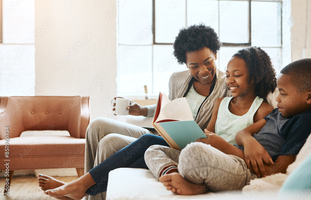 Home, happiness and mother with kids, reading book and literature with fantasy, knowledge and bonding together. Apartment, single parent and mama with children, smile and storytelling in living room Home, happiness and mother with kids, reading book and literature with fantasy, knowledge and bonding together. Apartment, single parent and mama with children, smile and storytelling in living room
