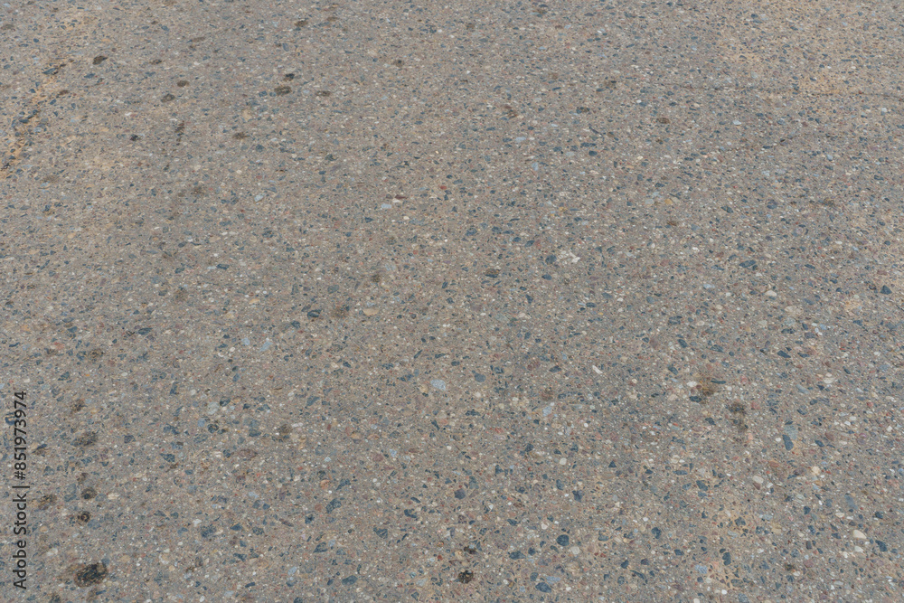 Empty asphalt road, close-up. Car tracks on the asphalt. Empty asphalt road, close-up. Car tracks on the asphalt.