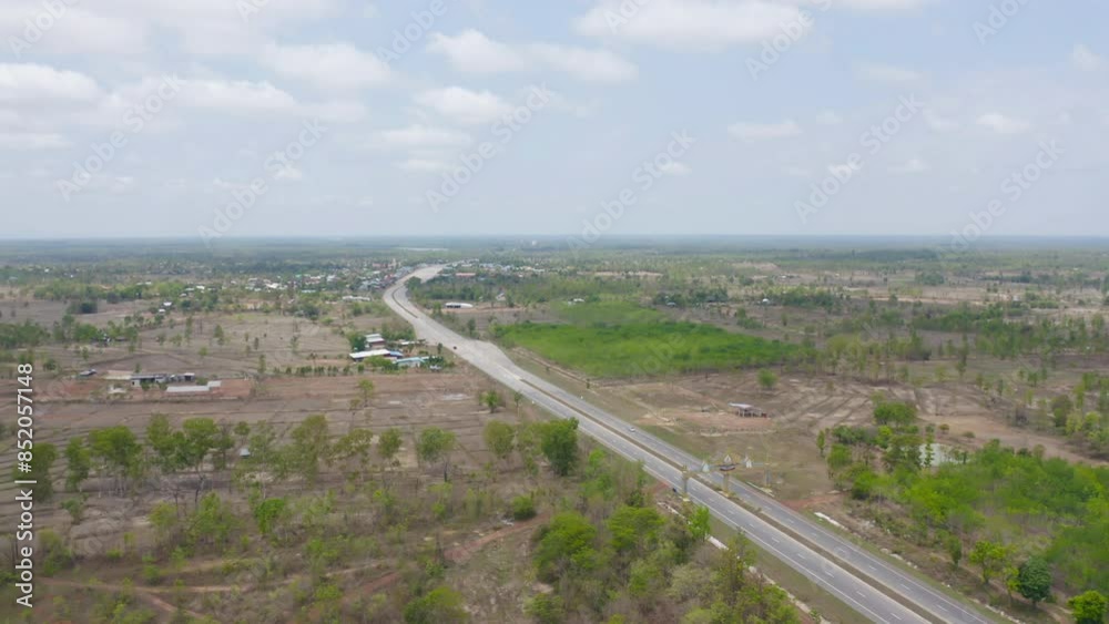 Aerial top view of fresh paddy rice, green agricultural fields in countryside or rural area in Asia, Thiland. Nature landscape Aerial top view of fresh paddy rice, green agricultural fields in countryside or rural area in Asia, Thiland. Nature landscape