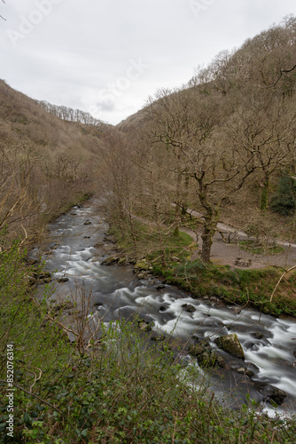 Long exposure of the East Lyn river flowing through Watersmeet valley in Exmoor National Park © tom