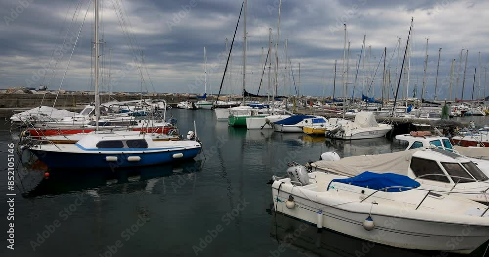 Trieste Italy sailboat marina harbor. City seaport in northeastern Italy. Adriatic Sea and Slovenia. Seaport and a prosperous trading hub in the Mediterranean. Historical buildings. Trieste Italy sailboat marina harbor. City seaport in northeastern Italy. Adriatic Sea and Slovenia. Seaport and a prosperous trading hub in the Mediterranean. Historical buildings.