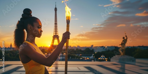 African american athletic girl holding torch with flame in France. Olympics Games Fire. Opening ceremony. Summer Olympic Games in France. Banner or card with copy space photo