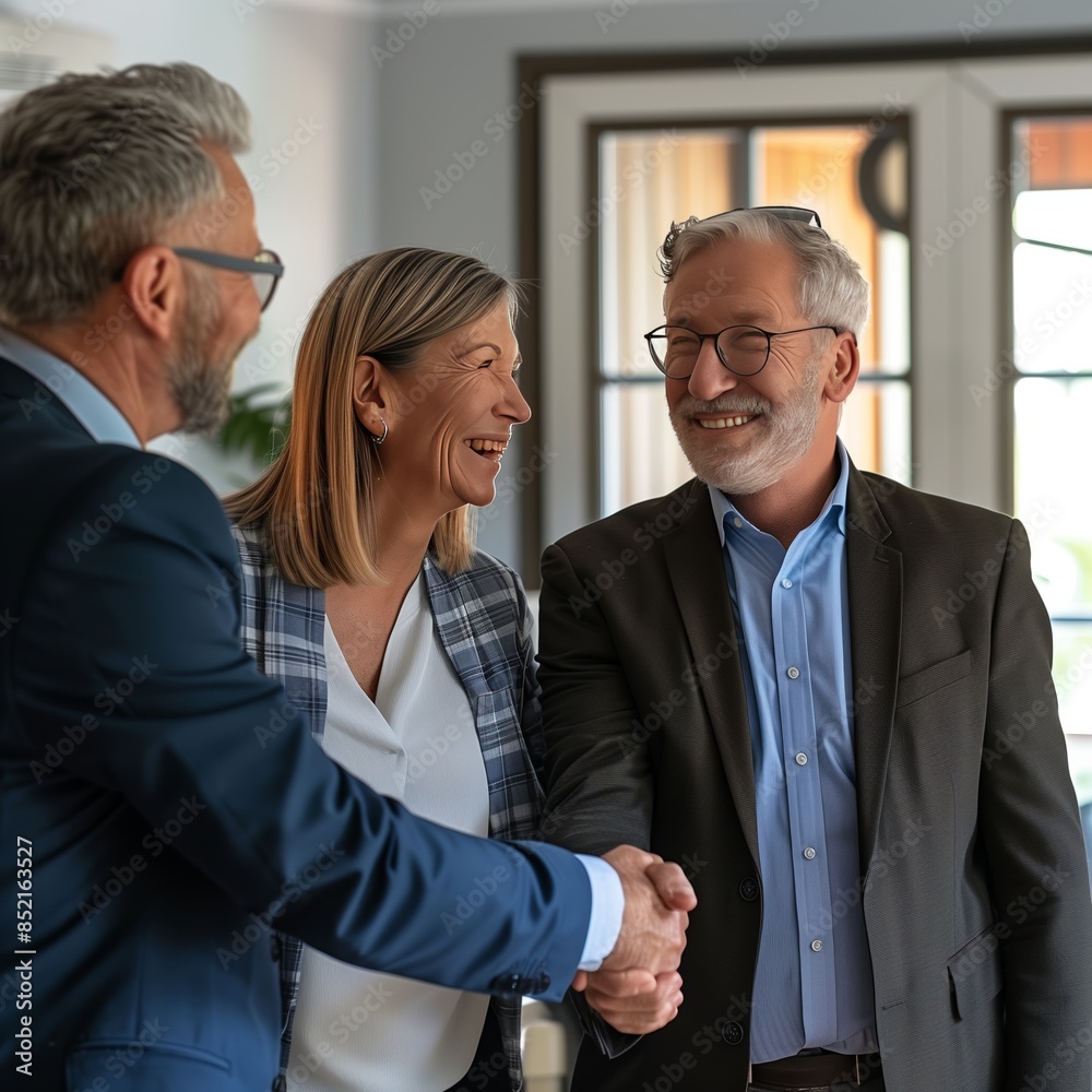 Financial Advisor Meeting with Elderly Couple at Home Financial Advisor Meeting with Elderly Couple at Home
