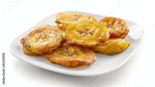 A plate of Dominican food consisting of fried plantains isolated on a white background