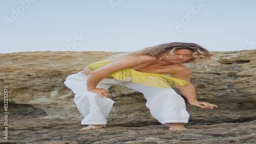 Wallpaper Mural Modern style dancer moving body stone rock vertically. Woman performing dance  Torontodigital.ca