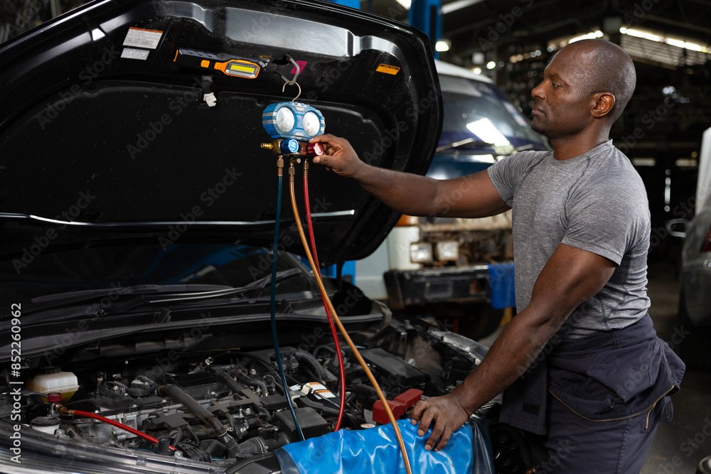 custom made wallpaper toronto digitalmechanic worker fixing and checking a car air conditioning system in automobile repair shop