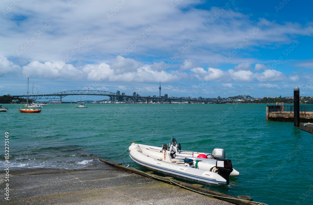 Scenery at Birkenhead Beach Auckland New Zealand; View to Harbour Bridge and Auckland City