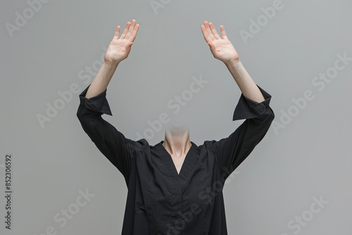 Conceptual portrait of a headless girl raising her arms, demonstrating a novelty promotion without facial expressions, focusing solely on the business aspect