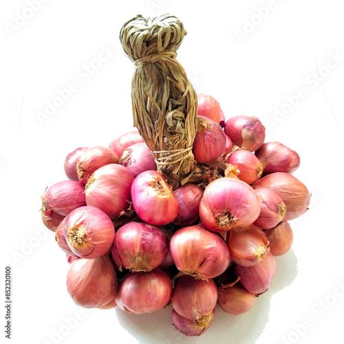 Big bunch of onions on a white background