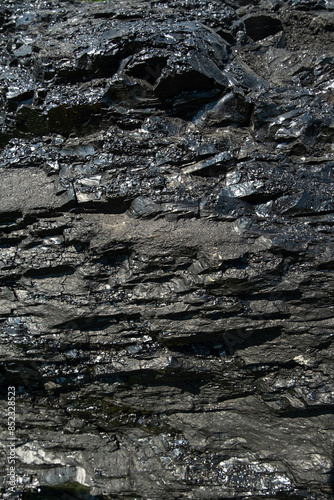Hard coal texture. Black background.
