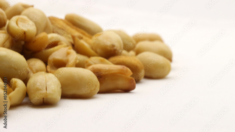 Delicious fried peanuts isolated Delicious fried peanuts isolated