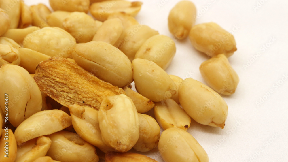 Delicious fried peanuts isolated Delicious fried peanuts isolated