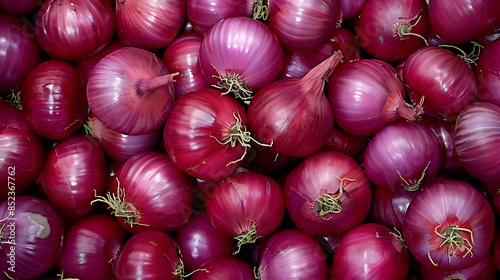 red onions on market stall,
Red onion in a glass bowl with water drops
