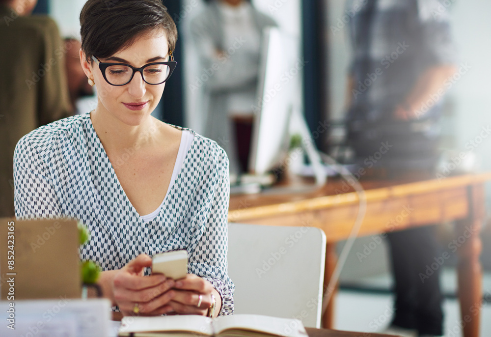 Phone, typing and business woman at desk with online chat, research and networking on social media. Communication, connectivity and consultant in office with smartphone, notes and mobile app for info
