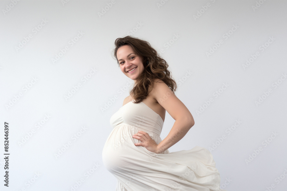 young indian pregnant woman standing on white background young indian pregnant woman standing on white background