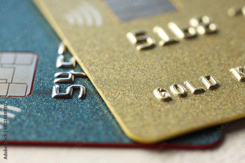 Two plastic credit cards on table, macro view Two plastic credit cards on table, macro view